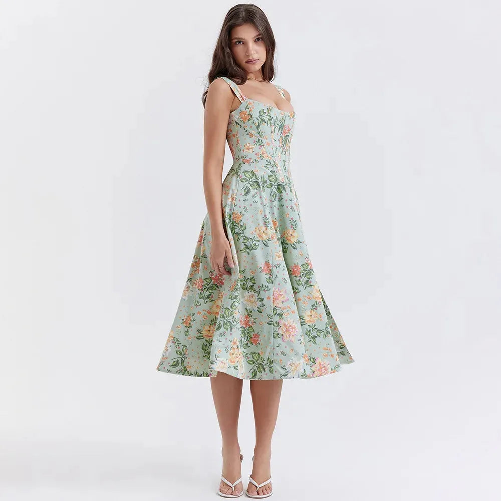 Modelo usando vestido midi verde con corset floral, ideal para boda civil o eventos primaverales.